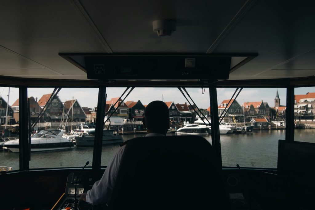 a group of people on a boat in the water
